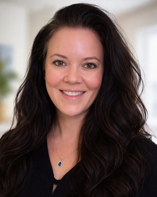 Erika Joy Puruleski, MSN, APRN, PMHNP-BC, smiling